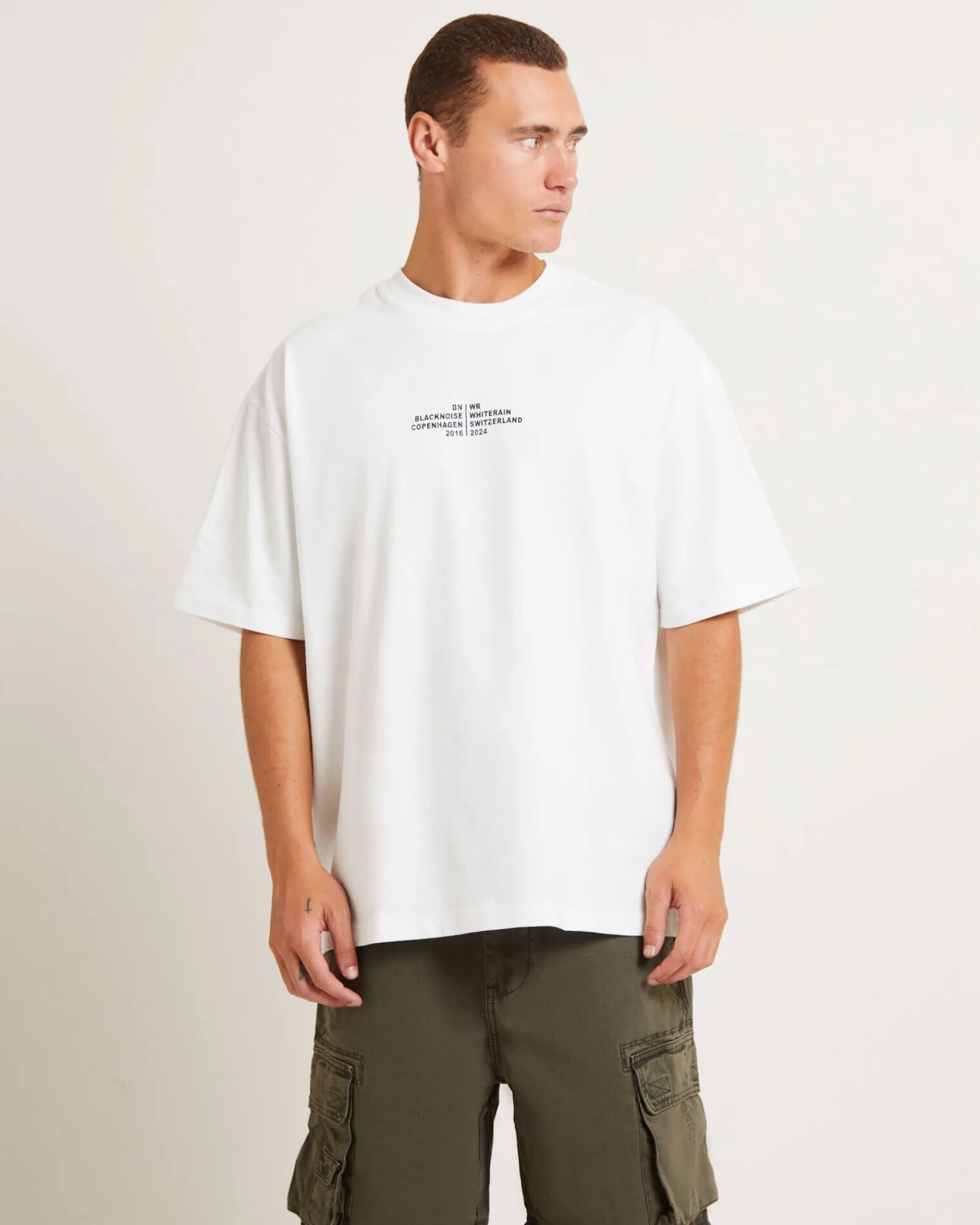 tour_short_sleeve_tshirt__0.webp New BLACK NOISE WHITE RAIN Tour Short Sleeve T-Shirt In White